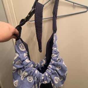 Reversible sling carrier